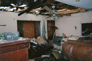 Collapsed ceiling and structure damage.